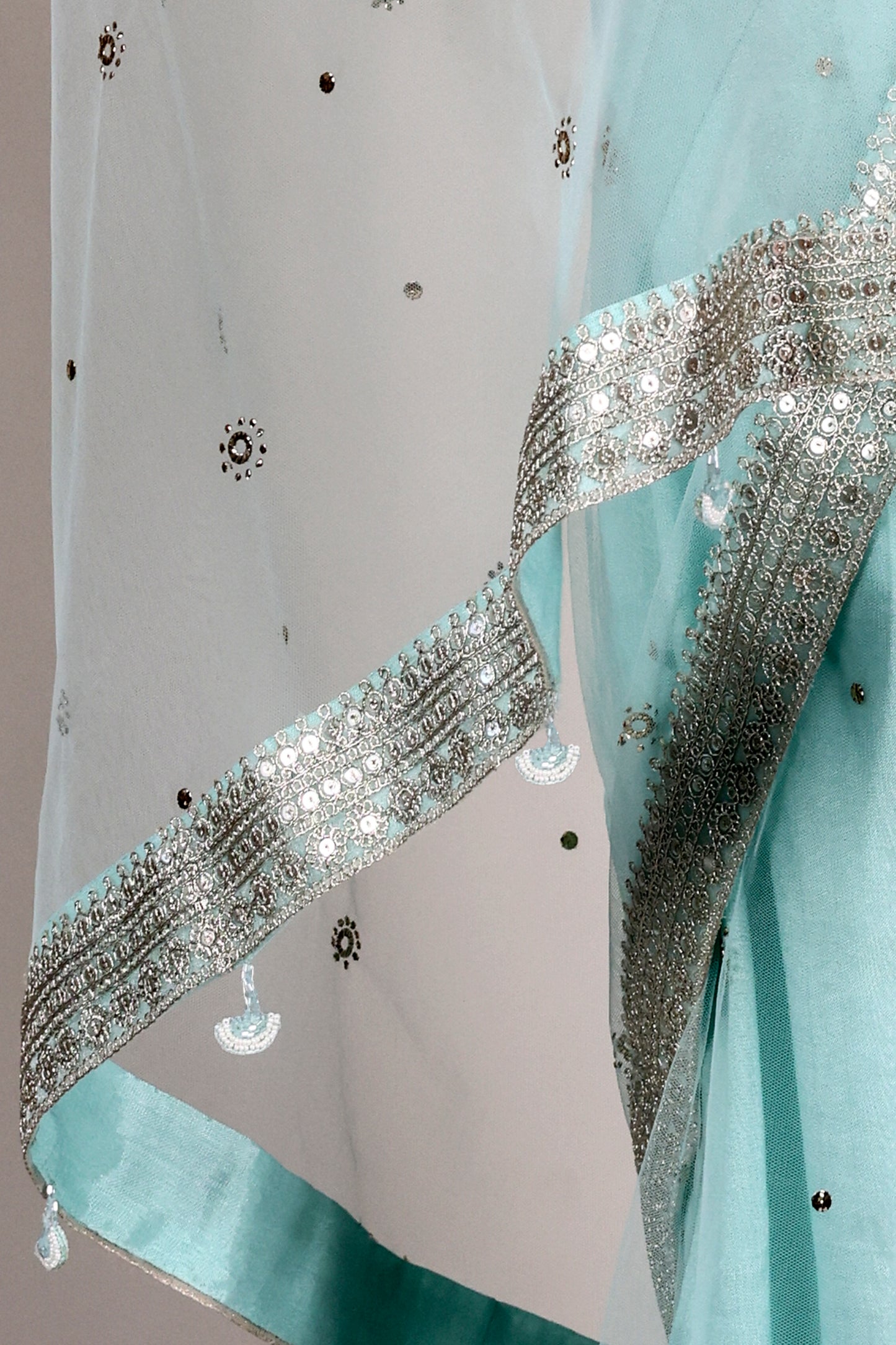 Sea Green Soft Net Saree with Mukesh Embellishment, Silver Lace & Bead Tassels