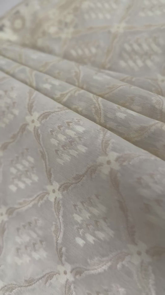 Cream Woven Organza Silk Saree with Intricate Diamond Pattern, Floral Border, Lurex Butta Facing, and Tassels on Saree and Blouse